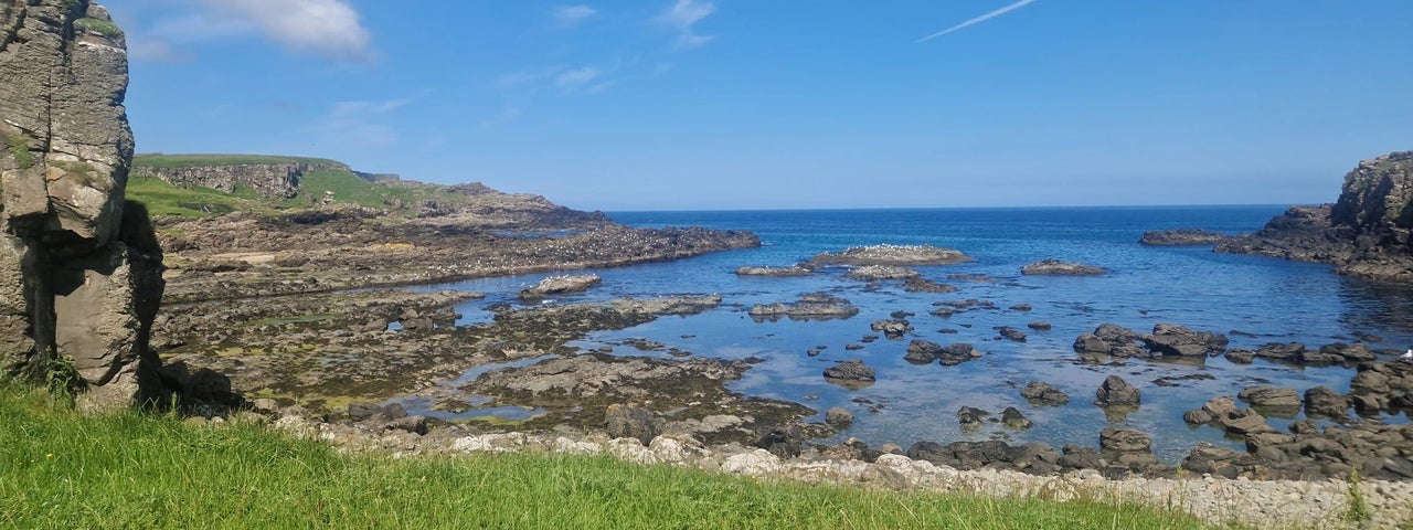 A view of a rocky shoreline with Wander Éire Tours