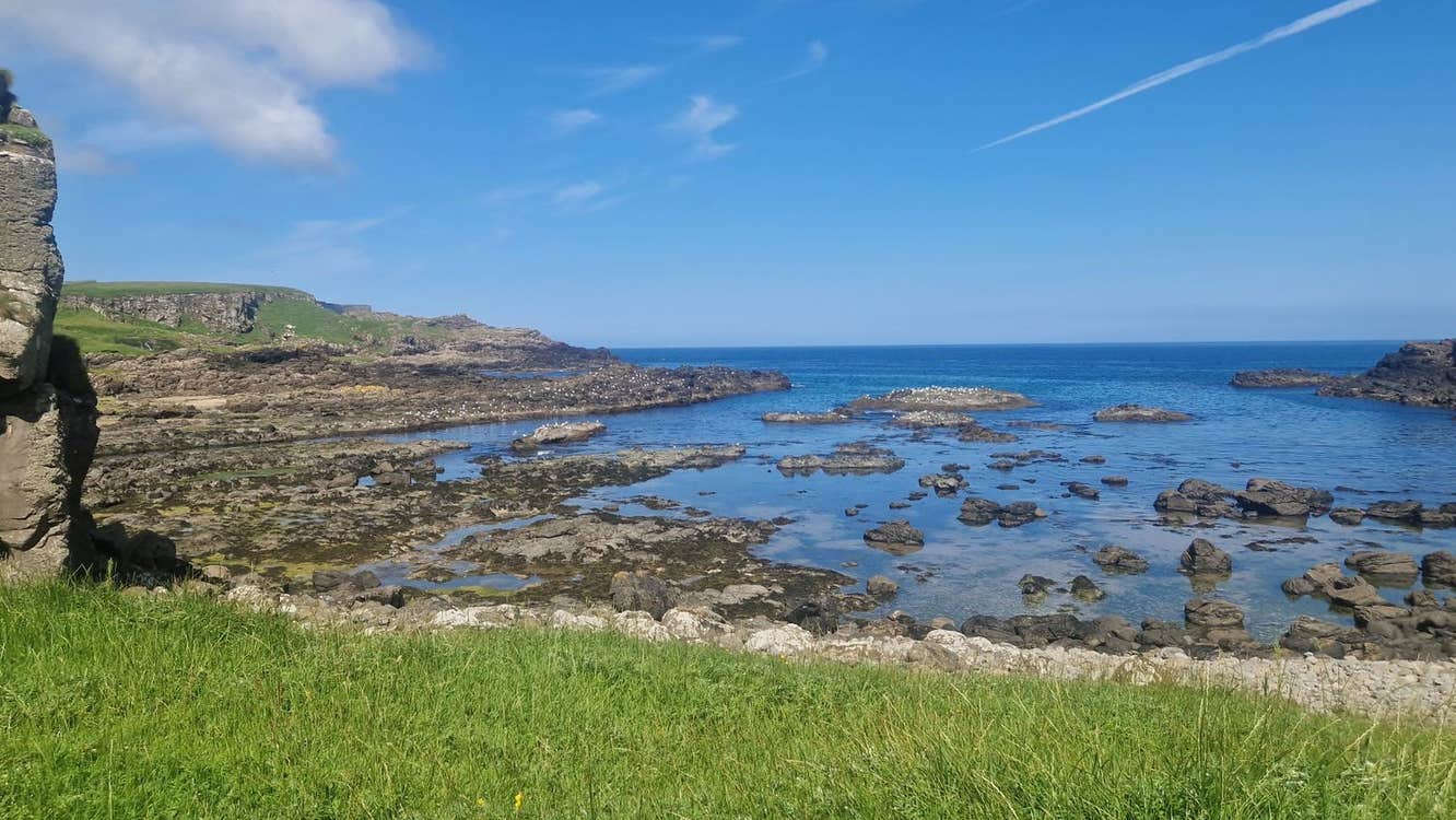 A view of a rocky shoreline with Wander Éire Tours