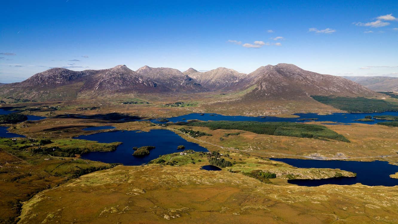 Mountains behind the blue water of Derryclare Lough