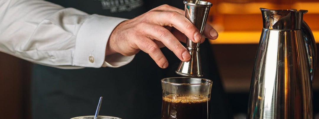 Mixologist Making Irish Coffee