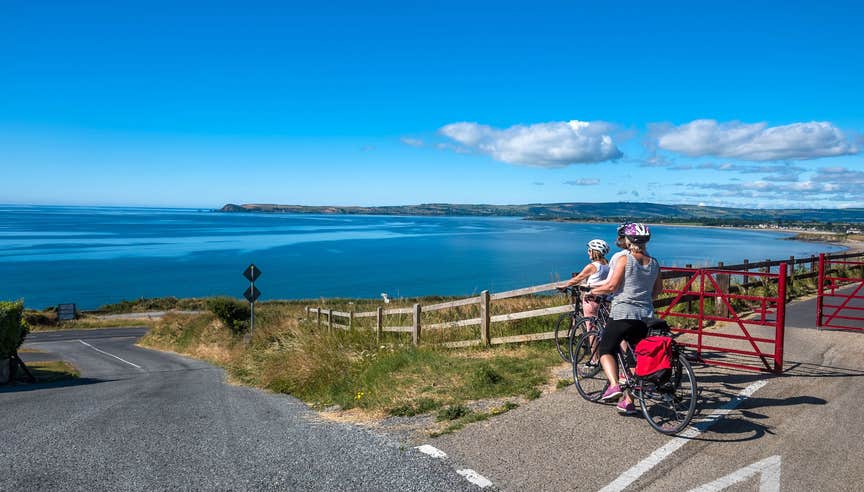 Cyclists taking in the scenic views at Waterford Greenway County Waterford 