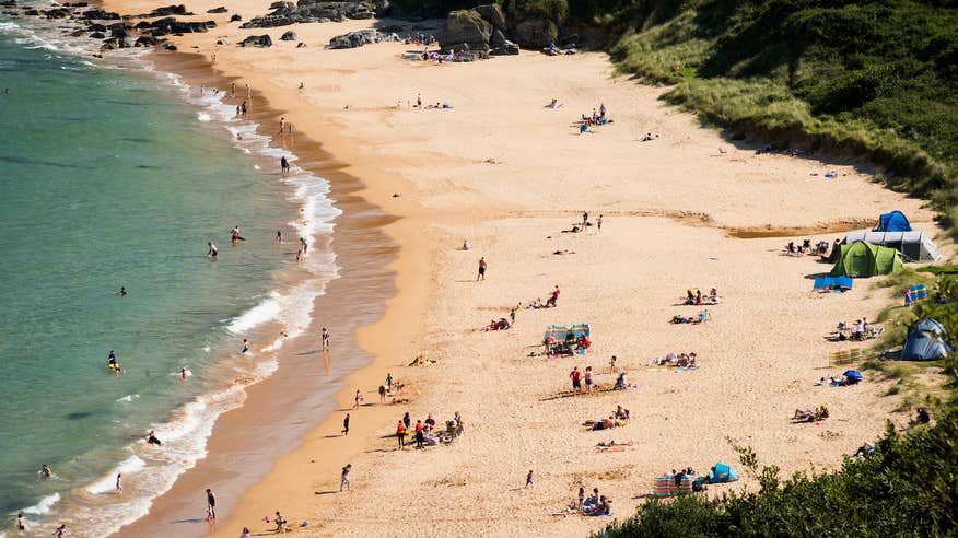 Aerial view of people on Kinnagoe Bay in Co Donegal