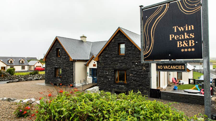 Exterior of house with stone frontage