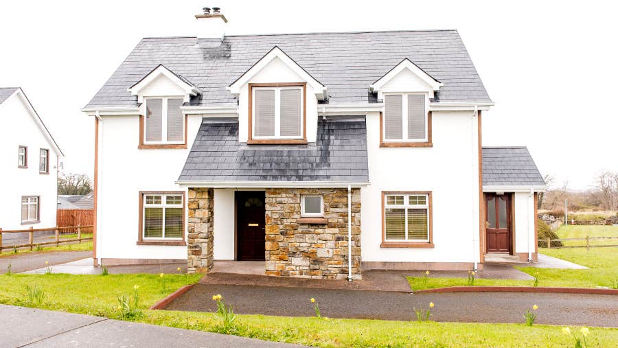Outside of property with parking space infront