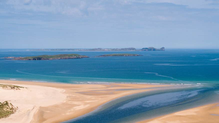 Blue water and golden sand at Tory Island, Co. Donegal