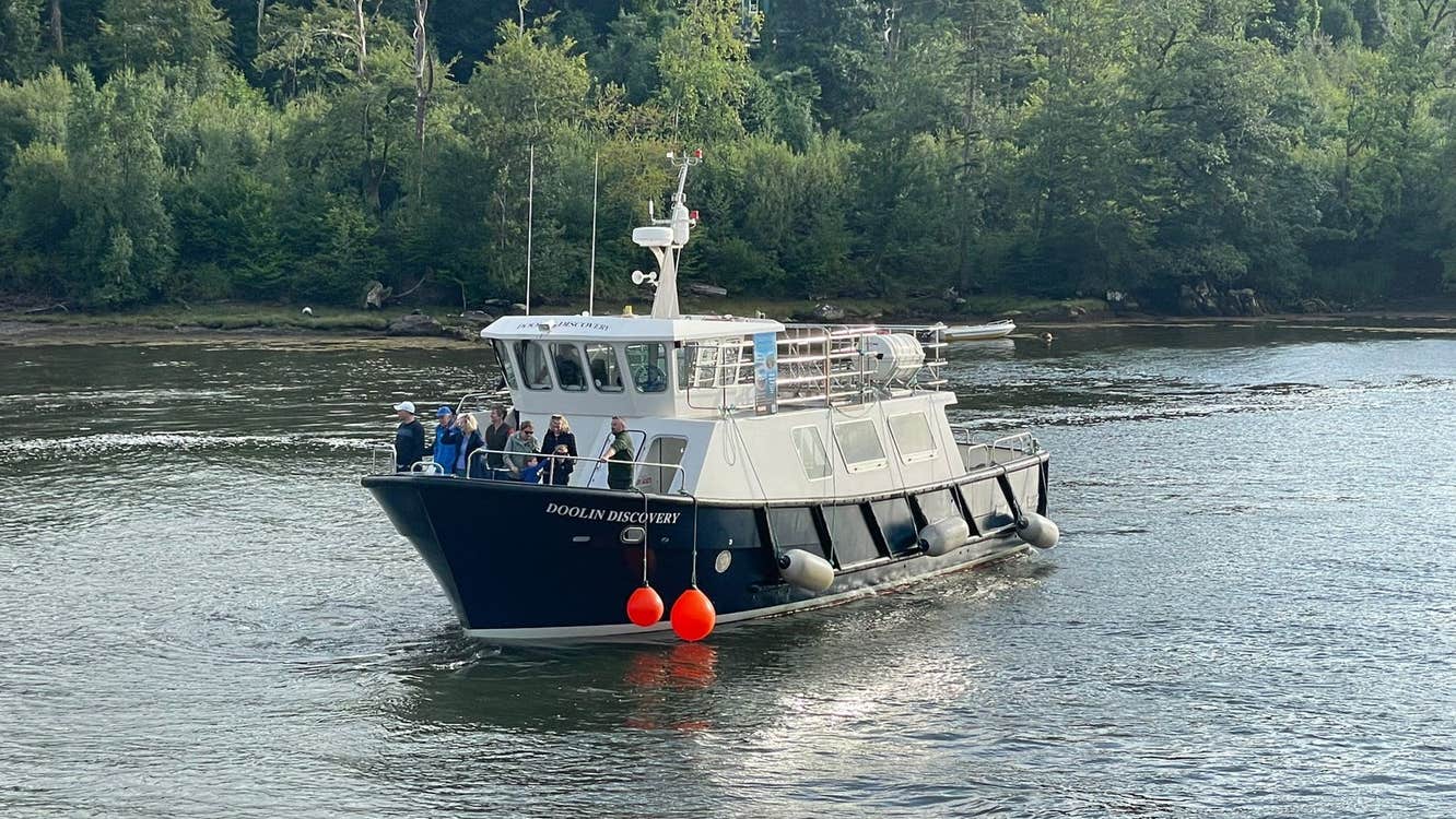 A tour boat with passengers at sea
