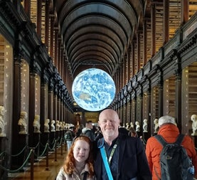 Dublin Walkabout Tours guide with guests in Trinity College Library