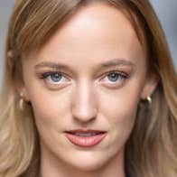 Headshot of woman with long blonde hair