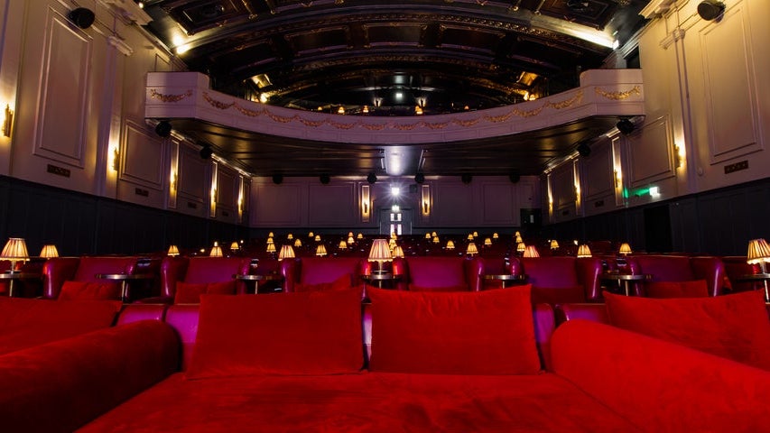 A view of plush seating in a restored old cinema