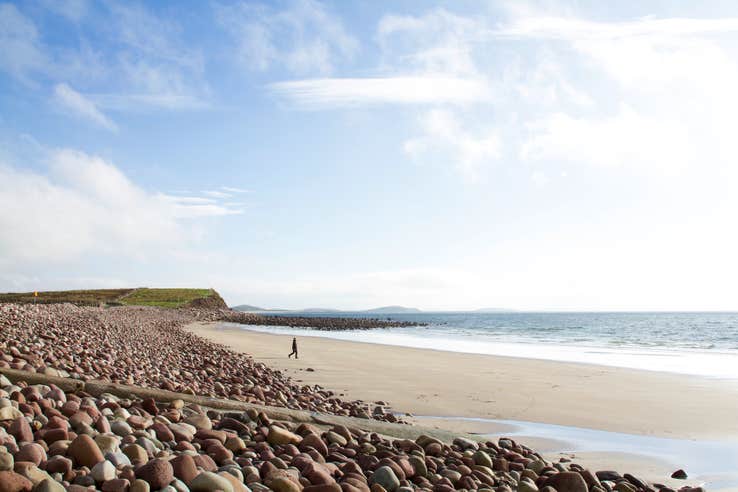 A person on Mulranny Beach in County Mayo