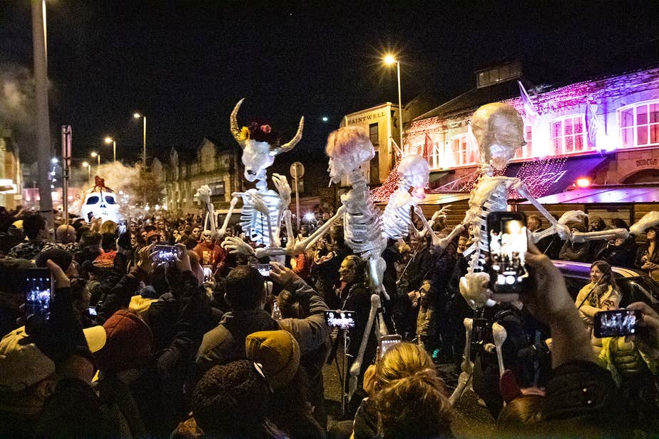 The Dragon of Shandon Samhain Parade 2018, featuring CCAL's Skeleton Dancers interacting with the crowd on Cornmarket Street, Cork City during the Parade.