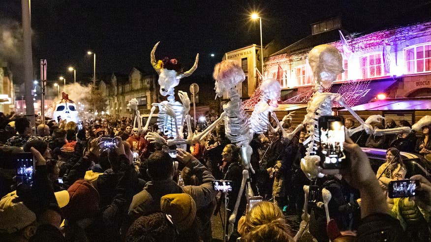 The Dragon of Shandon Samhain Parade 2018, featuring CCAL's Skeleton Dancers interacting with the crowd on Cornmarket Street, Cork City during the Parade.