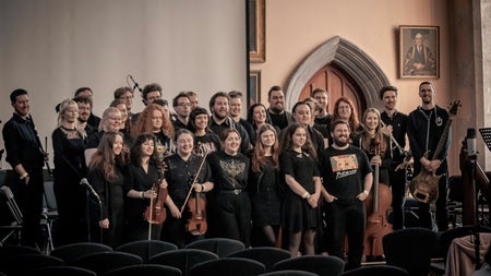 An image of the membership of the orchestra all together after performing together in Cork.