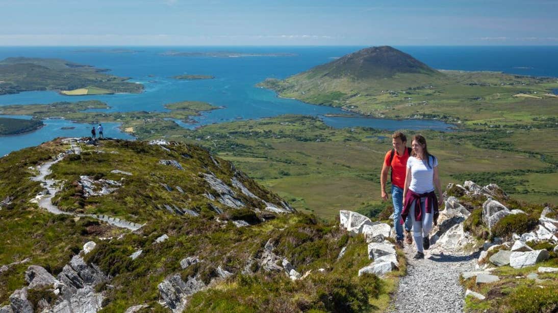Hikers at Diamond Hill on a sunny day in County Galway