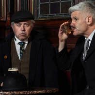 Counterparts & A Little Cloud - 2 men in old fashioned dark suits and ties drinking at a small table in a pub