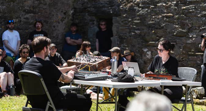 Amanda Feery performing live at Open Ear in Sherkin Abbey, by Malcolm McGettigan