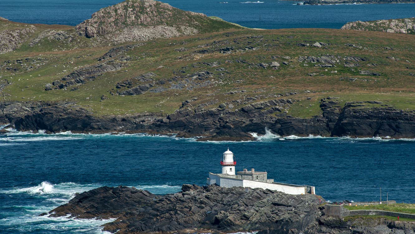 Landscape view of Valentia Island Lighthouse with the sea in the background