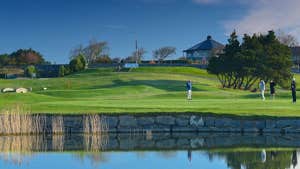 Image of men playing golf