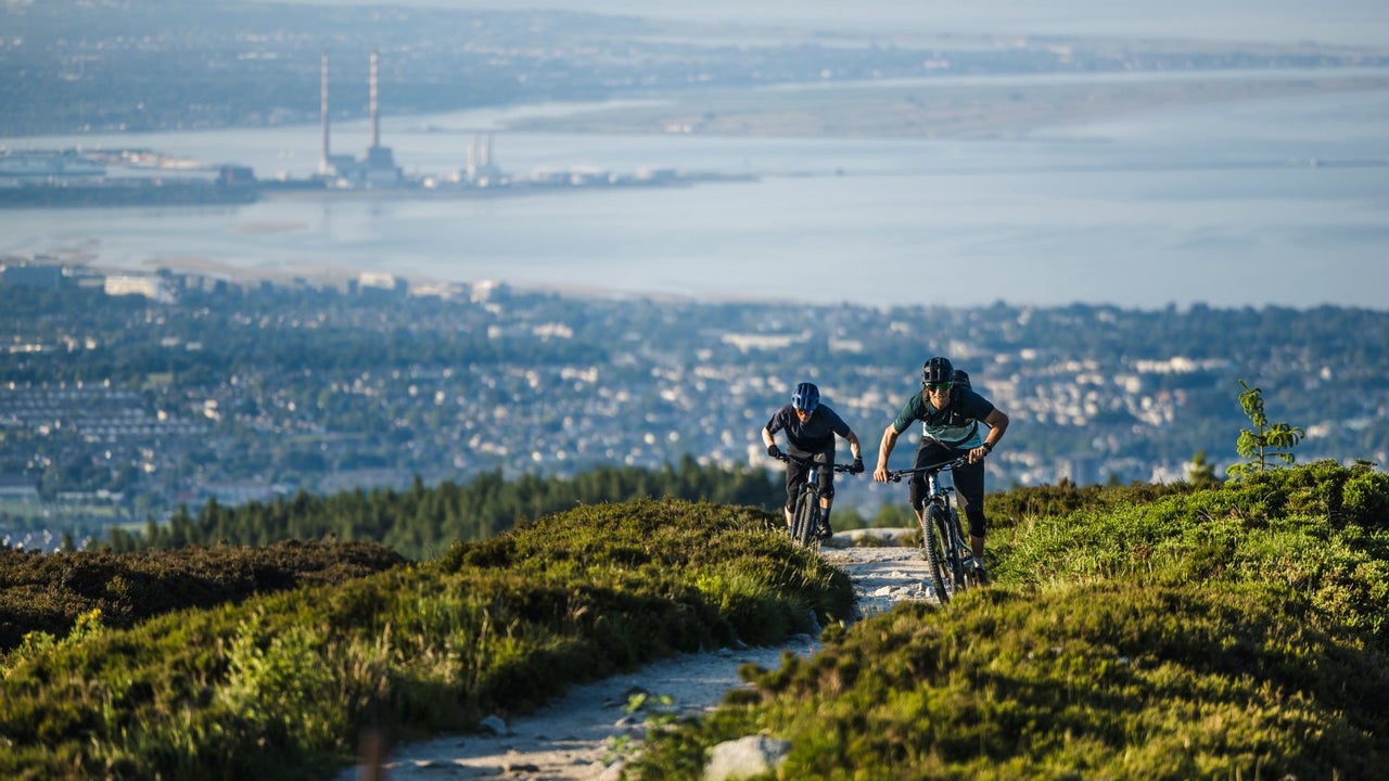Two mountain bikers on a mountain trail