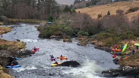 River kayaking with Wild Water Kayak Club