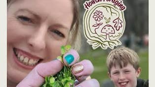 Close up view of smiling woman holding up handful of small green leaves, with young boy smiling in the background.