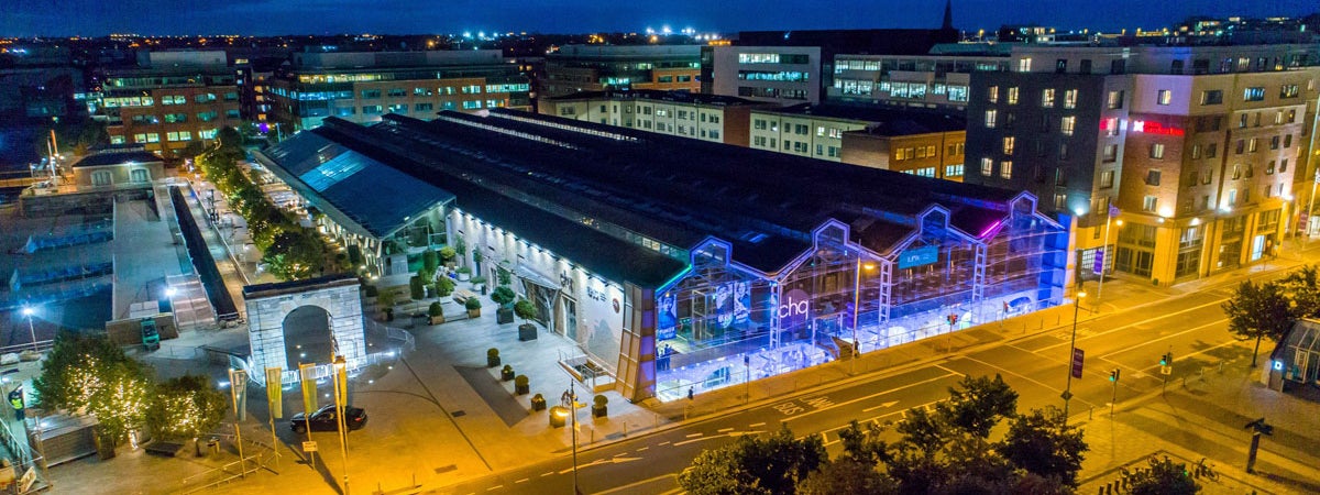 Image of CHQ building at night time with blue lighting