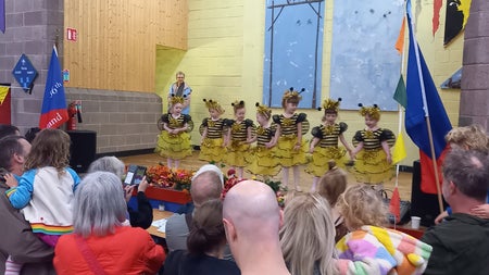 BuzzFest childrens performance on the stage in the scouts hall