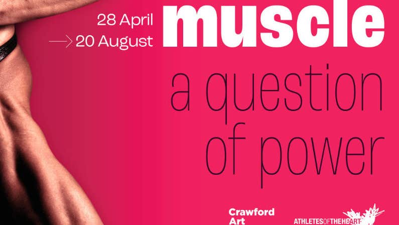 Part of exhibition poster, text in white and black against pinky/red background with a very partial image of a muscly body along the right hand side.