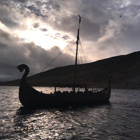 A Viking long boat on a dark evening