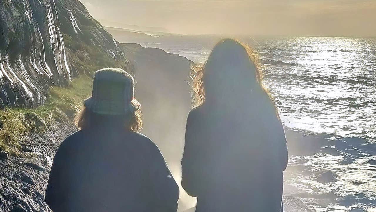 Two ladies looking out over the ocean