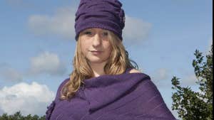 purple hat and poncho