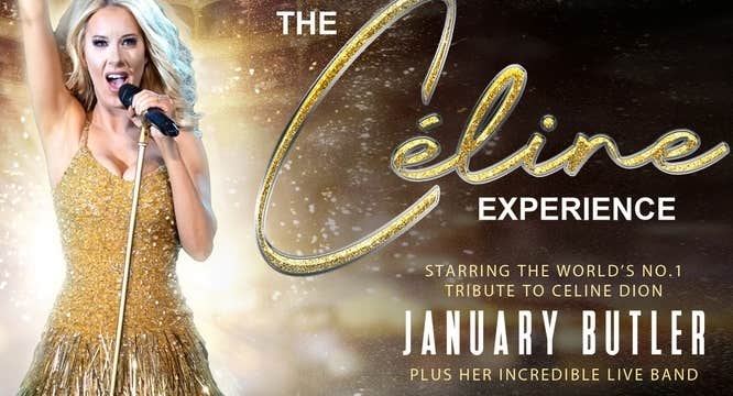 A woman in gold dress singing into handheld mic with one arm straight up in the air