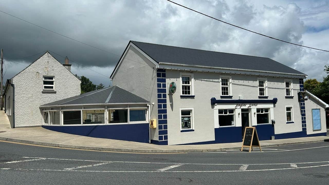 Exterior of a pub and restaurant on a quiet street