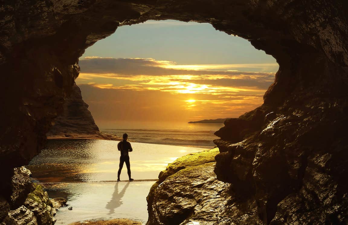 A man on Bundoran Beach in County Donegal at sunset
