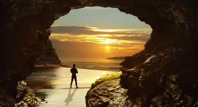 A man on Bundoran Beach in County Donegal at sunset