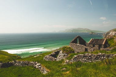 A stone cottage in ruins overlooking the ocean