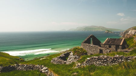 A stone cottage in ruins overlooking the ocean