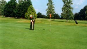 A man putting at Boyle Golf Club
