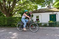 Couple cycling along the Royal Canal Greenway.