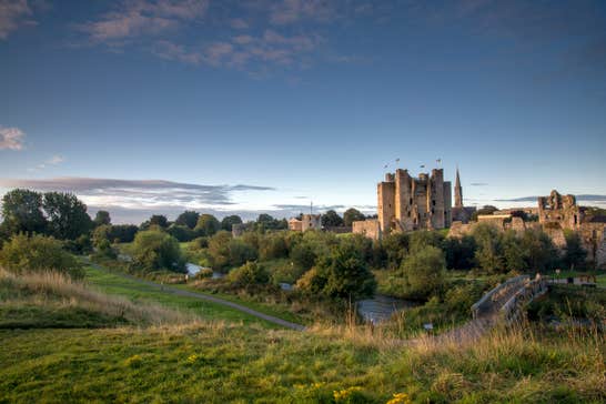Dusk at Trim Castle in Meath surrounded by green hills