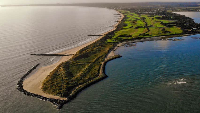 An aerial view of the course jutting out into the harbour