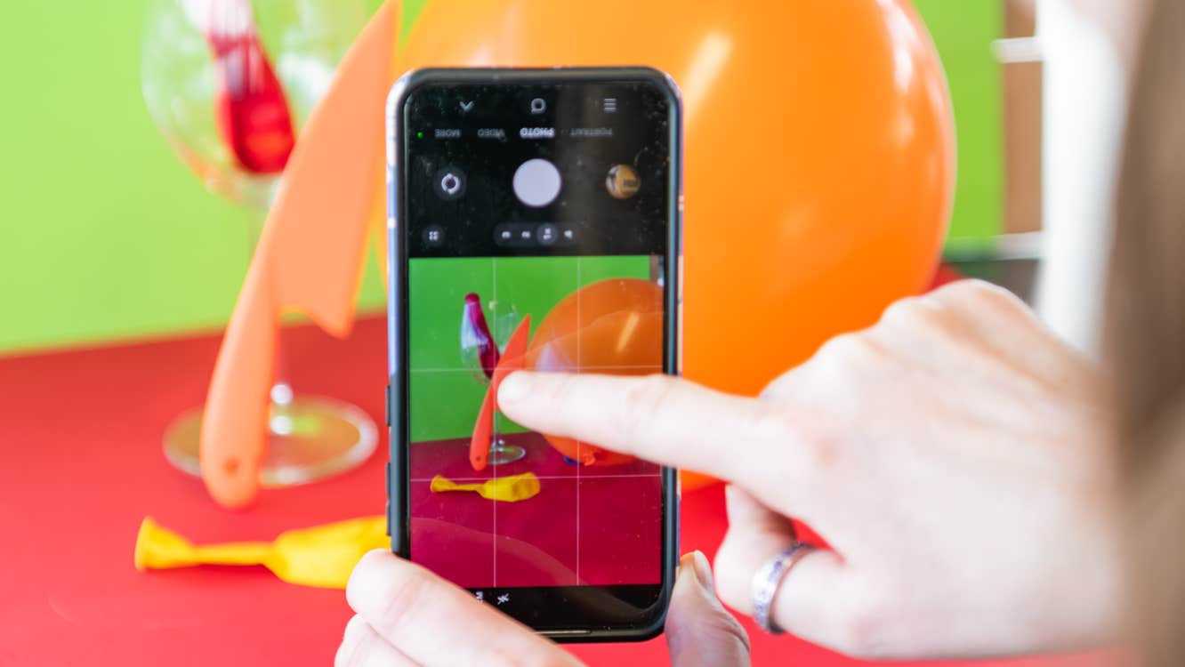 Someone is taking a photo with a smartphone.