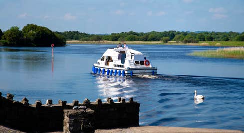 People on a river cruiser on the River Shannon.