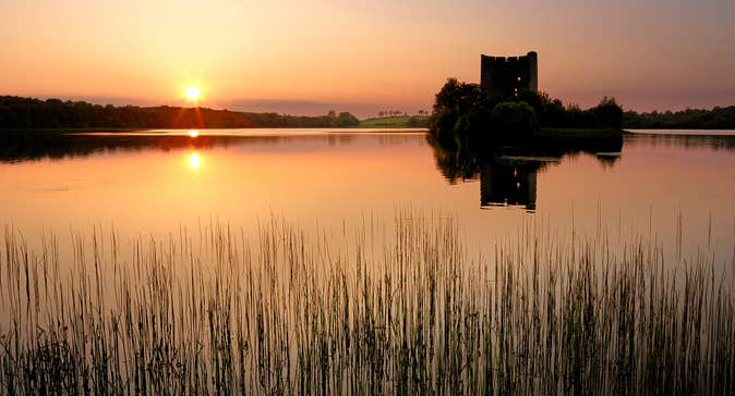 Sun setting over Cloughoughter, County Cavan