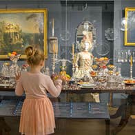 Irish Silver Museum view of a girl looking at ornate silver items in a display