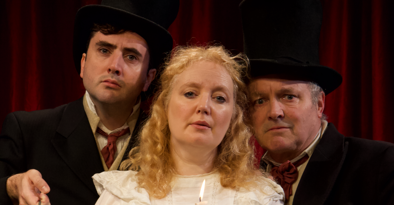 Rectangular image of actors in the Christmas Carol