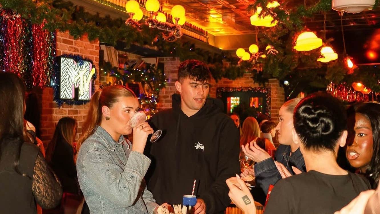 A group of friends enjoying cocktails at Jackies Bar