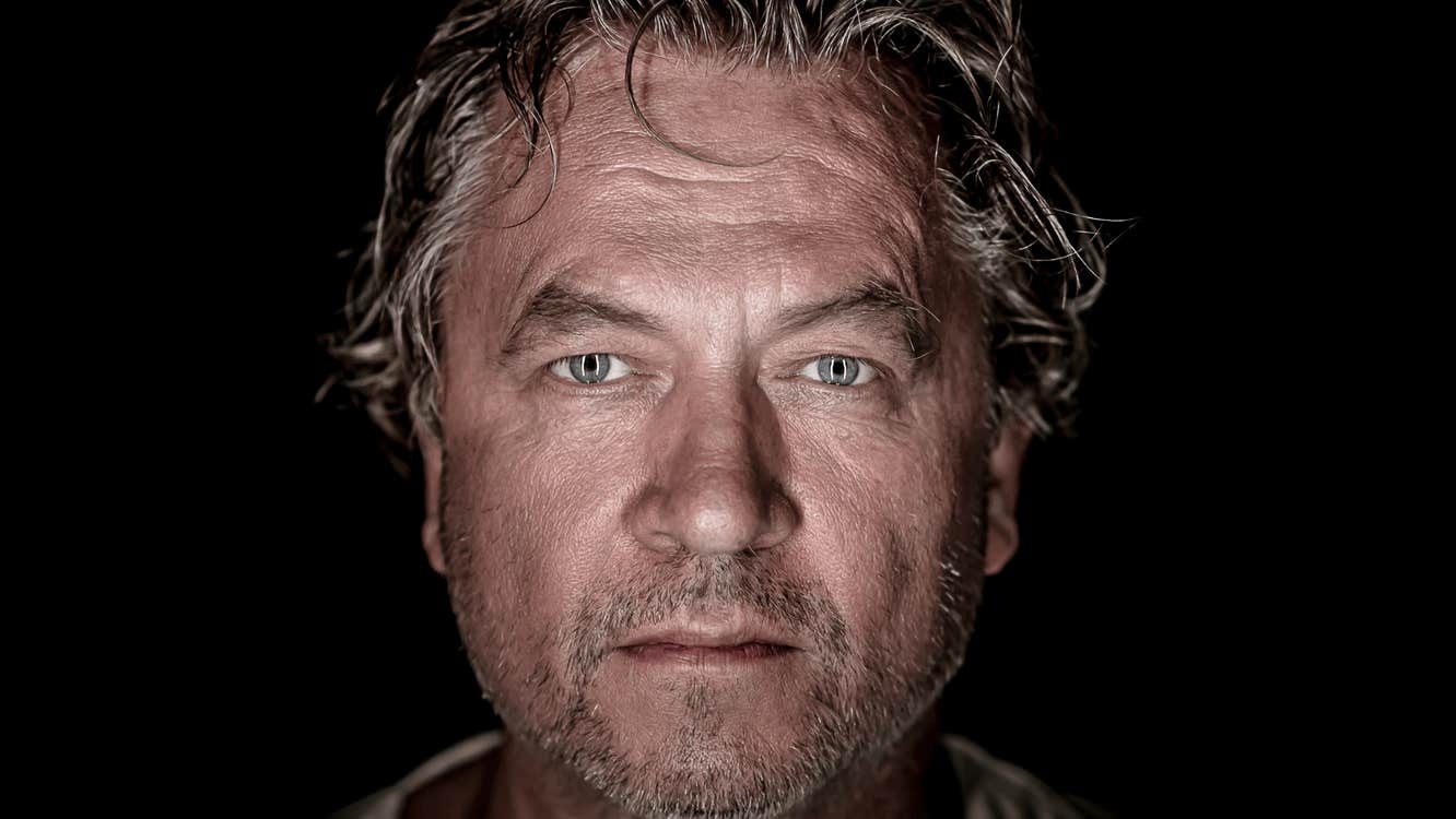 Nils Petter Molvaer in a black void.