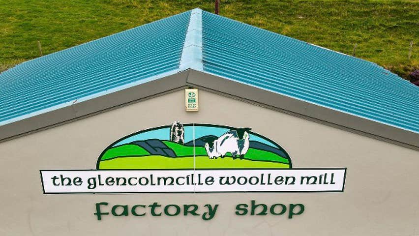 A view of the signage with the logo of the shop