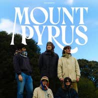 Dublin based musicians, Mount Pyrus - a group of 5 people, 2 seated at the front on grass, the others standing behind